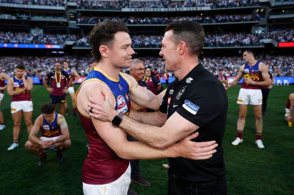 Lachie Neale and Craig McCrae (Fly) after the GF